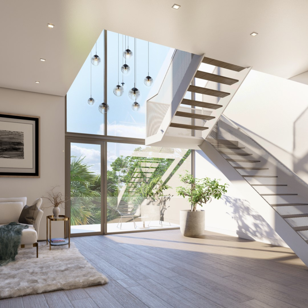 Modern living room with large floor-to-ceiling windows, floating staircase, glass railing, indoor plants, hanging lights, and light wood flooring. Sunlight streams in, creating a bright and airy atmosphere.